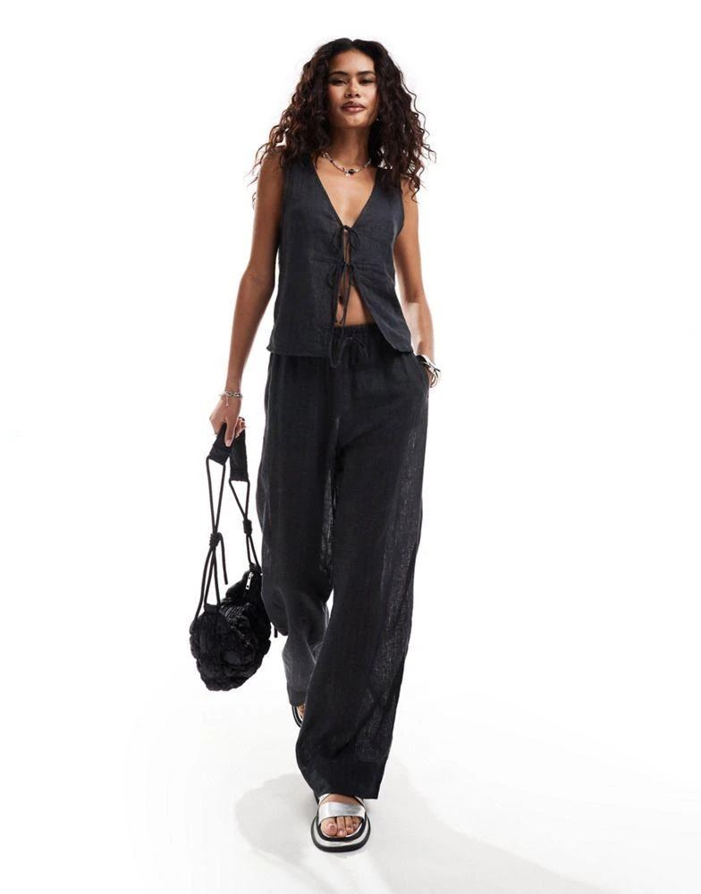 Weekday Weekday Mia co-ord pointelle trousers in off-black 1
