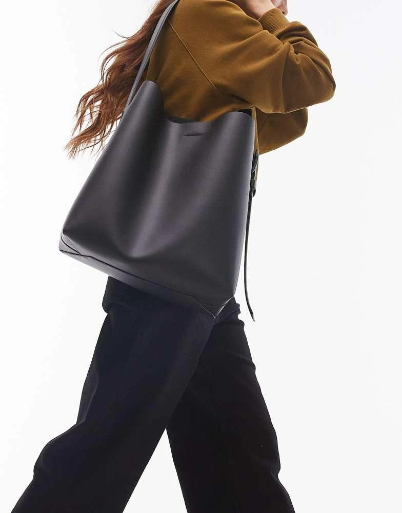 ARKET ARKET large leather bucket tote bag with side buckle in black 1