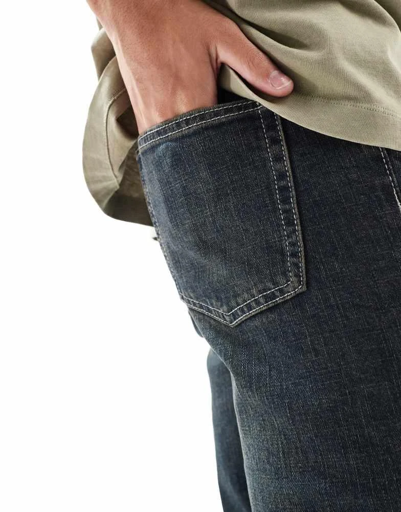 ASOS ASOS DESIGN skinny jeans in dark wash blue with tint 4
