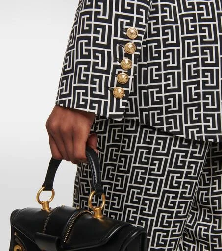 Balmain Double-breasted monogram jacket 6