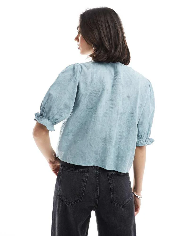 Pieces Pieces jaquard detail tie front puff sleeve top in soft blue 2