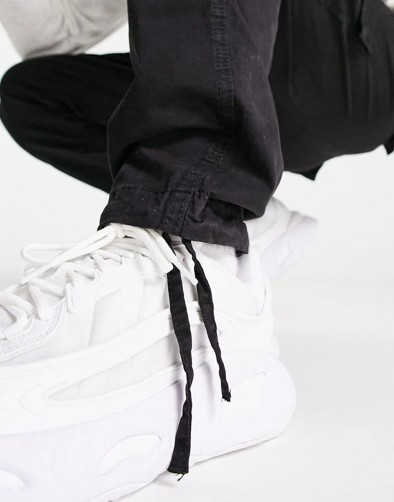 Jack 
Jones Jack 
Jones Intelligence tapered fit washed cargo trouser in black 3