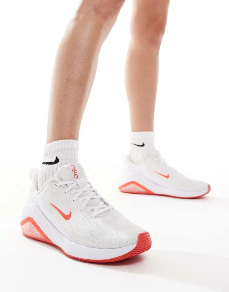 NIKE Nike Training Air Zoom Bella 7 trainers in white and pink 1