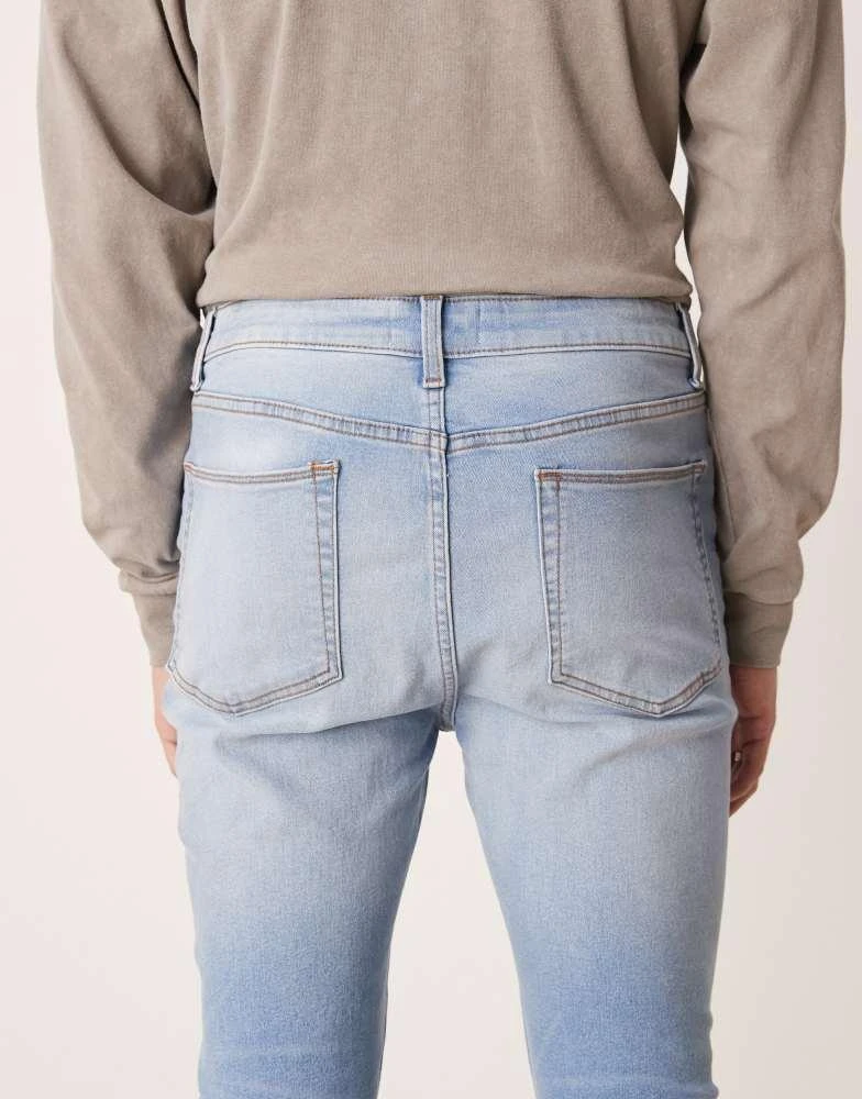 ASOS ASOS DESIGN power stretch jeans in light wash 4