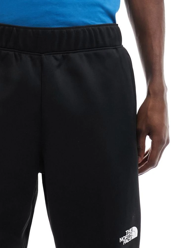 The North Face The North Face Training Reaxion fleece joggers in black 2