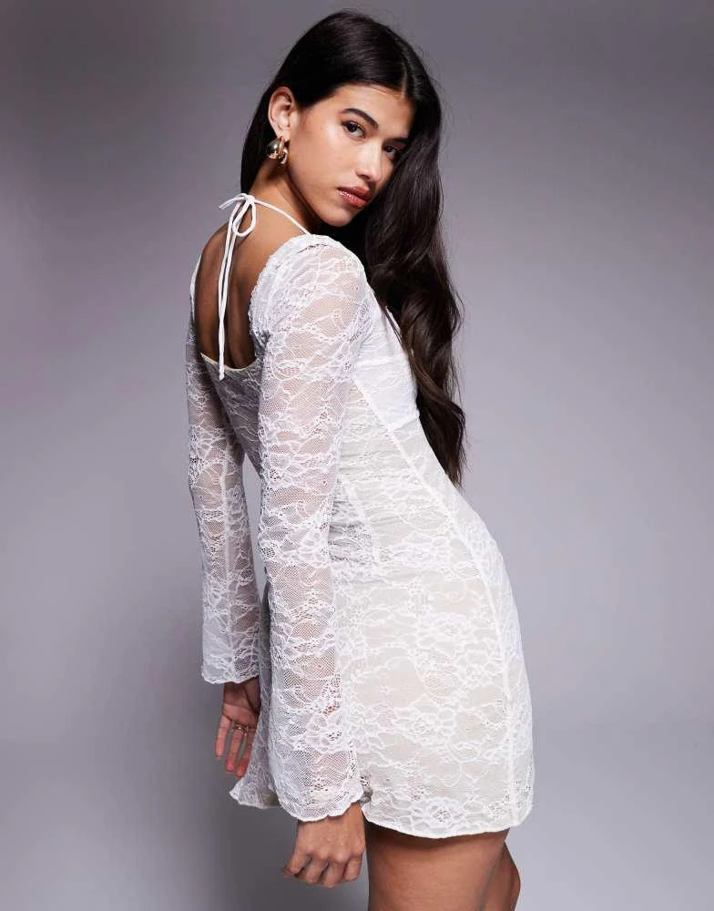 Shop Princess Polly Aubriella lace halterneck thigh split ruffle detail  mini dress in white on Sale at BeyondStyle  Get 32% Off Princess Polly  Aubriella lace halterneck thigh split ruffle detail mini