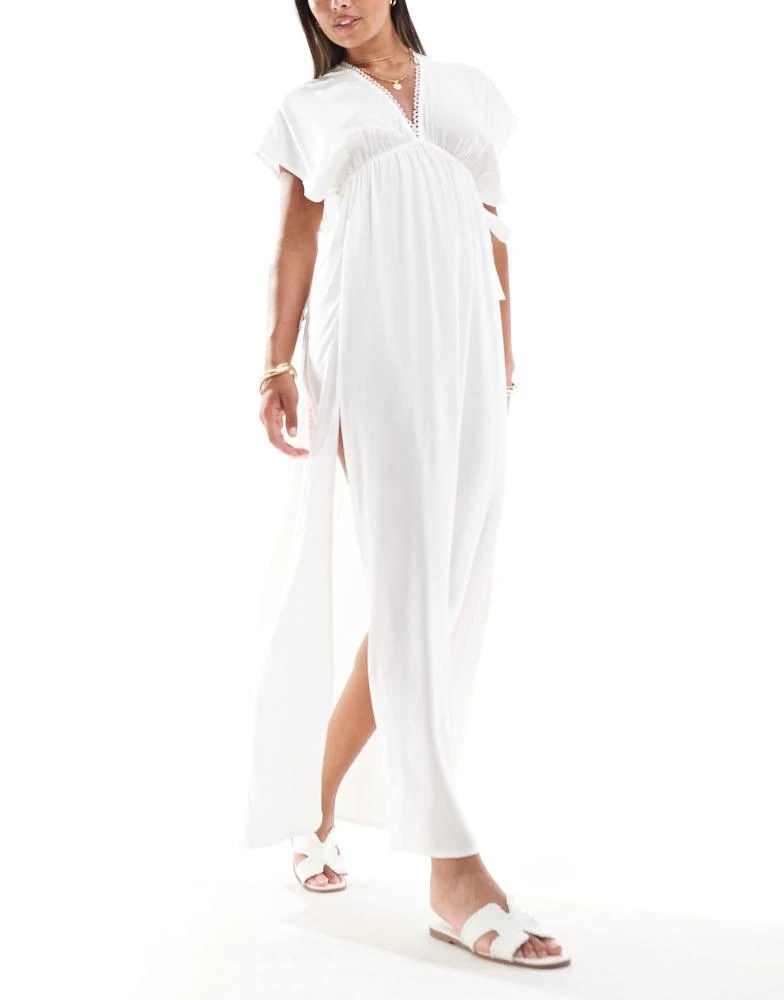 ASOS ASOS DESIGN Faye flutter sleeve maxi beach dress with channelled tie waist in white 1
