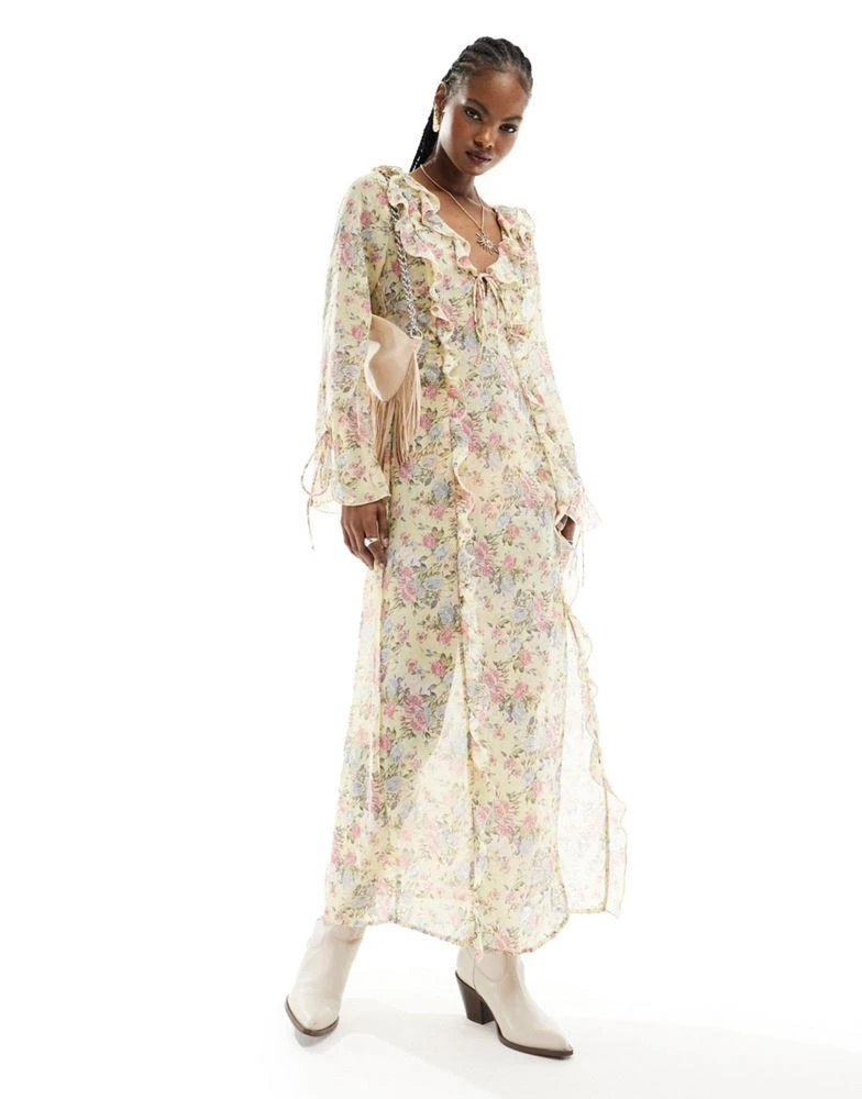 Kiss The Sky Kiss The Sky sheer maxi dress with ruffles and tie cuffs 1