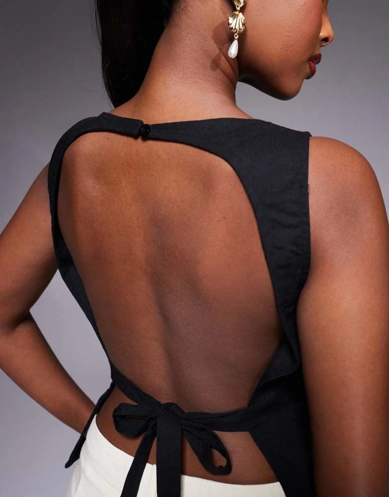 black floral backless dress Black Floral Halter Style Mini Dress – Fashion Cupcake main image 0
