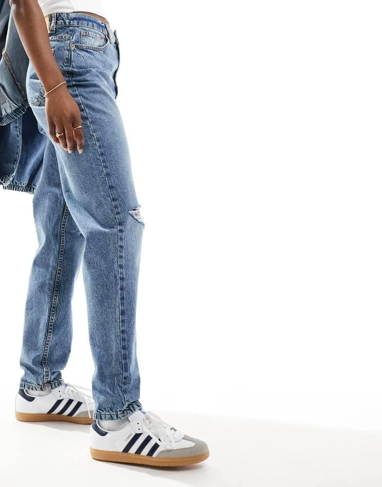 ASOS ASOS DESIGN high rise relaxed mom jeans with rips in mid blue 5