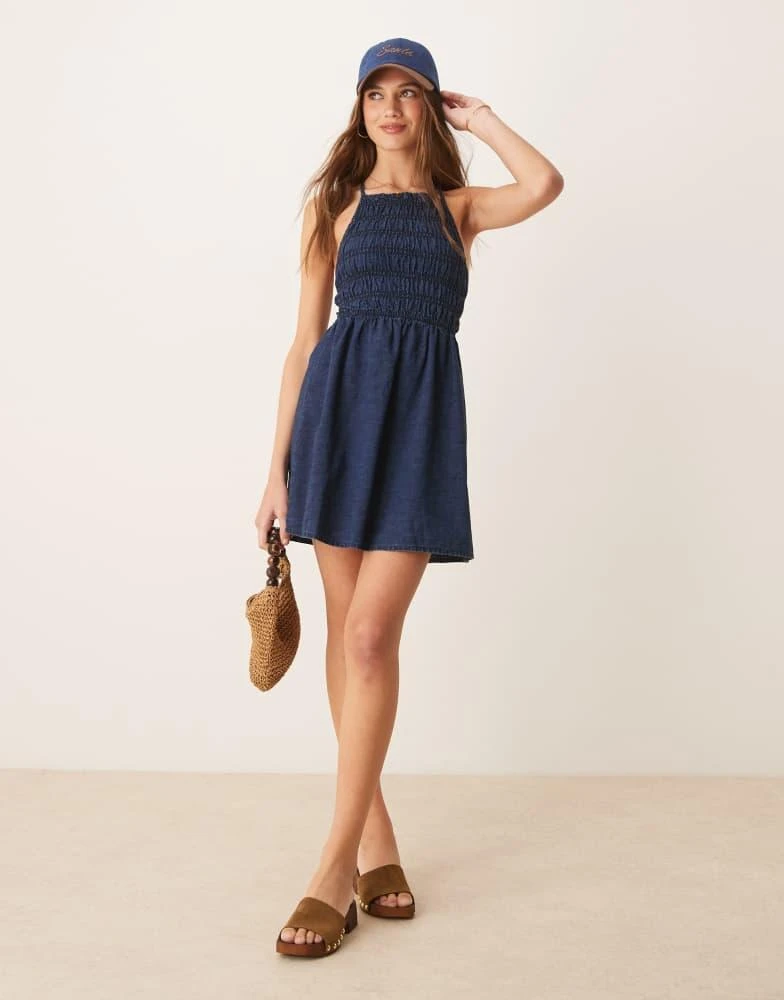 white christmas dresses PASS THE BUBBLY DENIM MINI DRESS – AKIRA main image 1