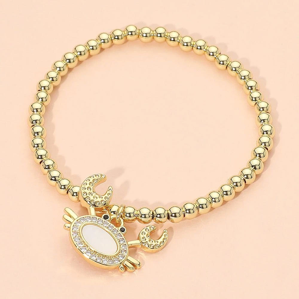 FASHNZFAB Stainless Steel Mother of Pearl CZ Stone Paved Crab Charm Beaded Stretch Bracelet