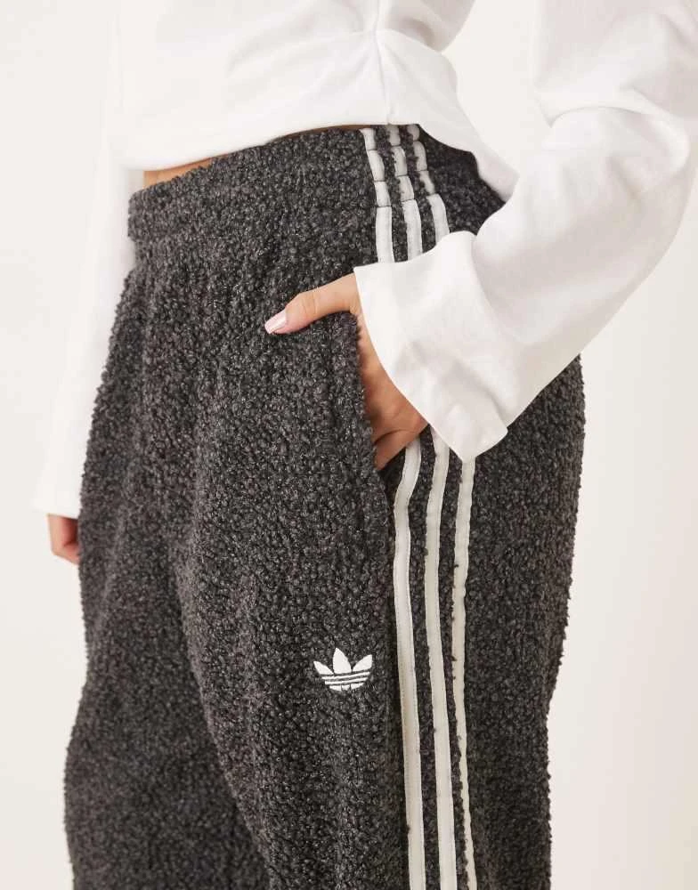 Adidas adidas Originals Boucle Firebird track pants in black 4