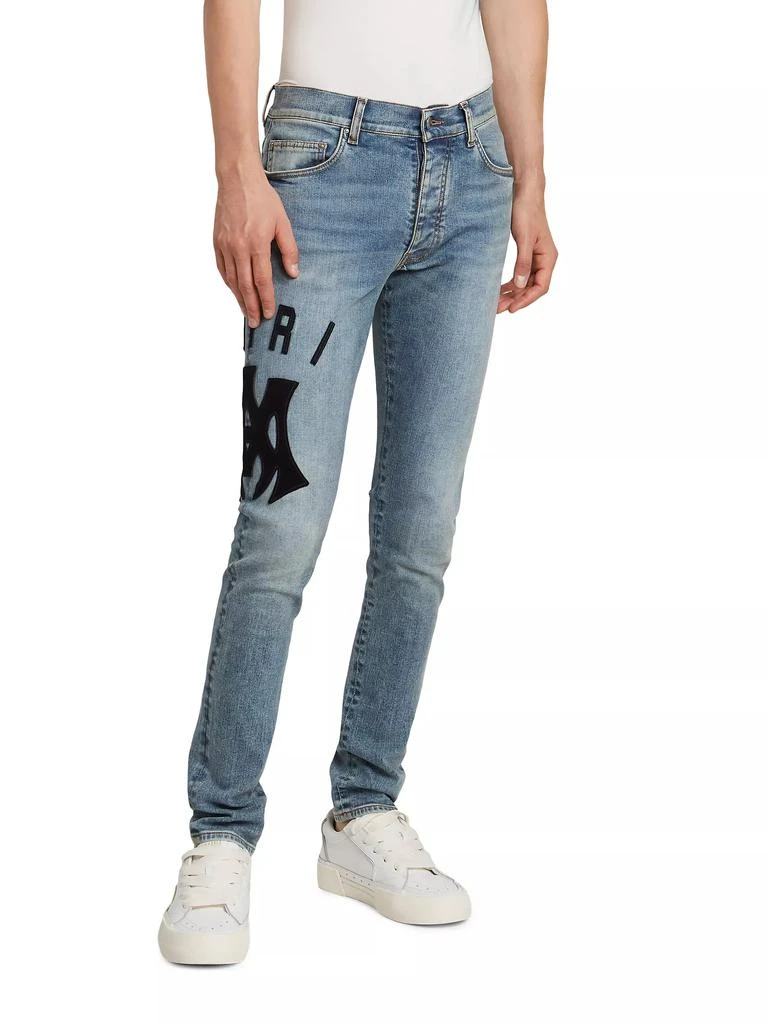 AMIRI Suede Appliqué Logo Skinny Jeans 4