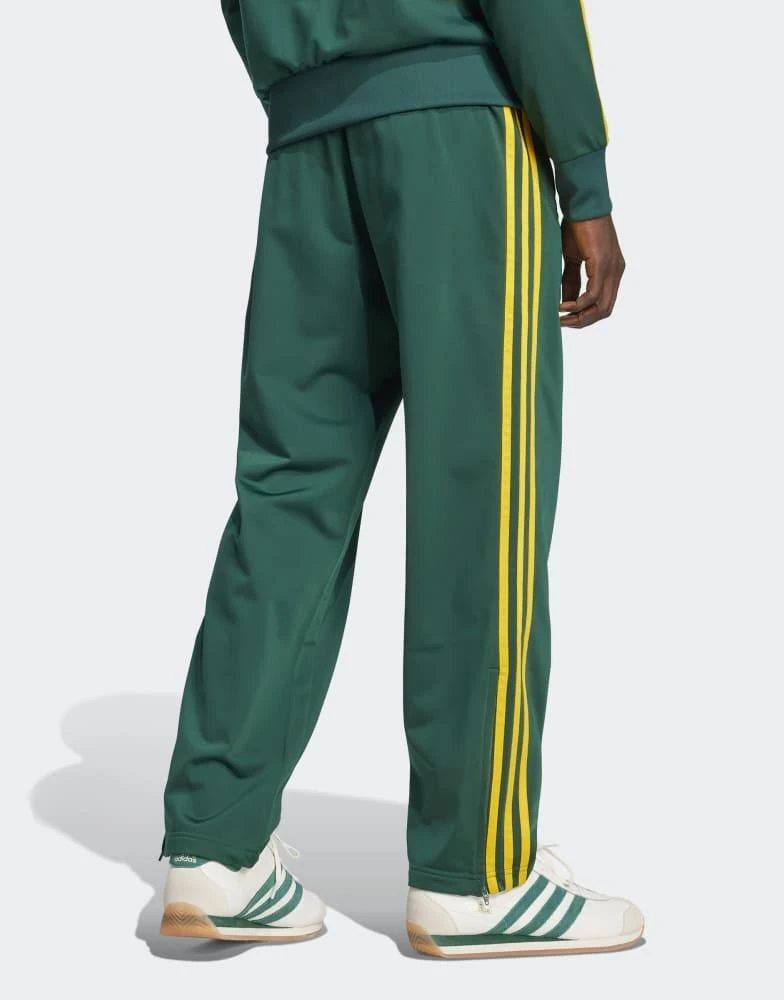 Adidas adidas Originals Firebird track pants in green and yellow 2