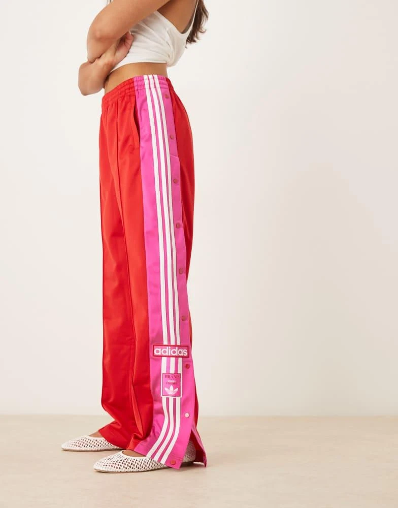 Adidas adidas Originals Adibreak track pants in red and pink 1
