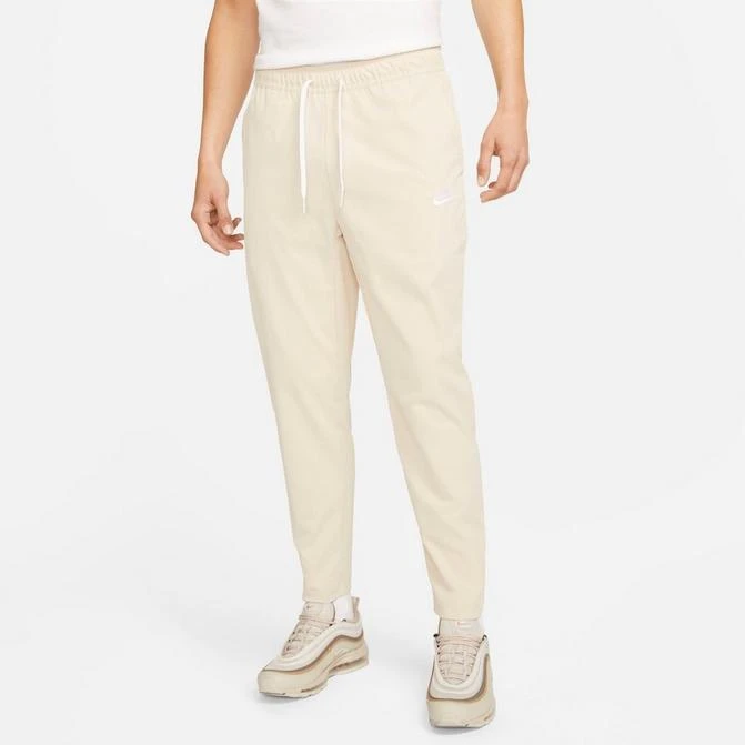 NIKE Men's Nike Club Woven Tapered Pants 1