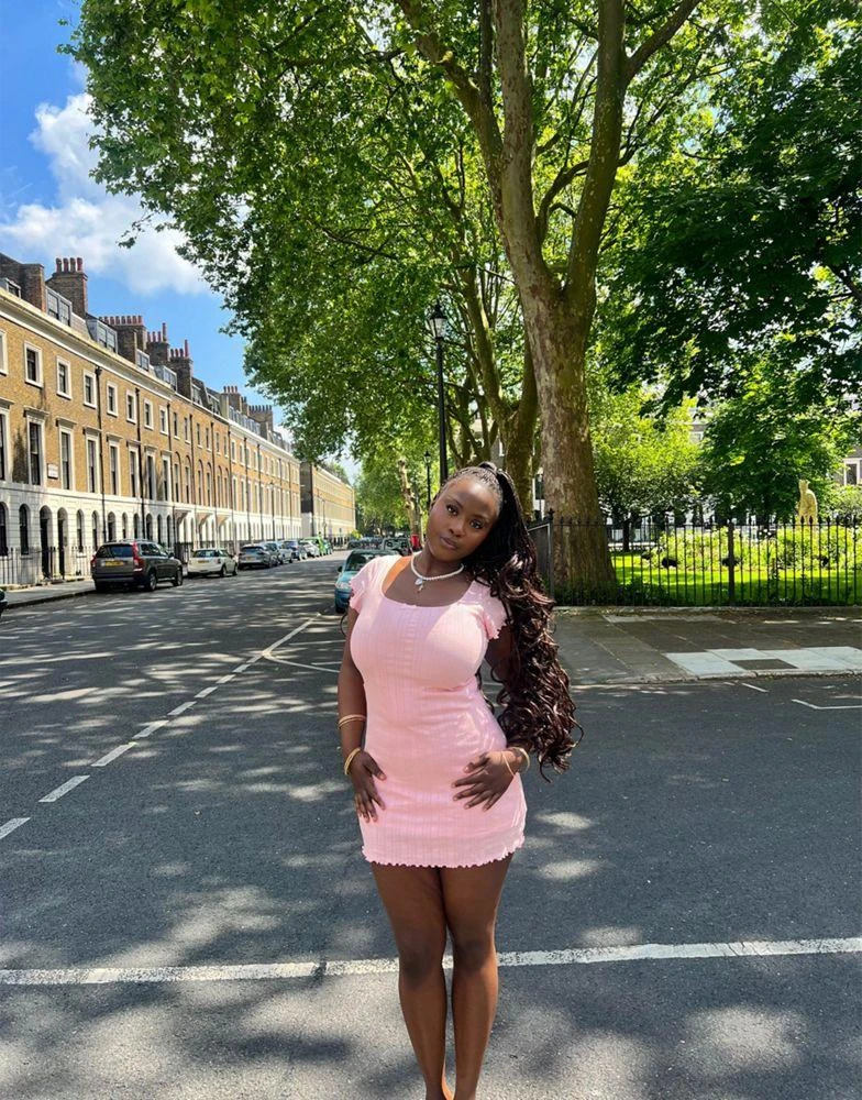 Labelrail Labelrail x Sumbo Owoyele scoop neck bow detail pointelle mini dress in baby pink 1