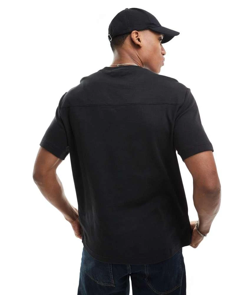 Calvin Klein Calvin Klein shadow embossed logo t-shirt in black 2