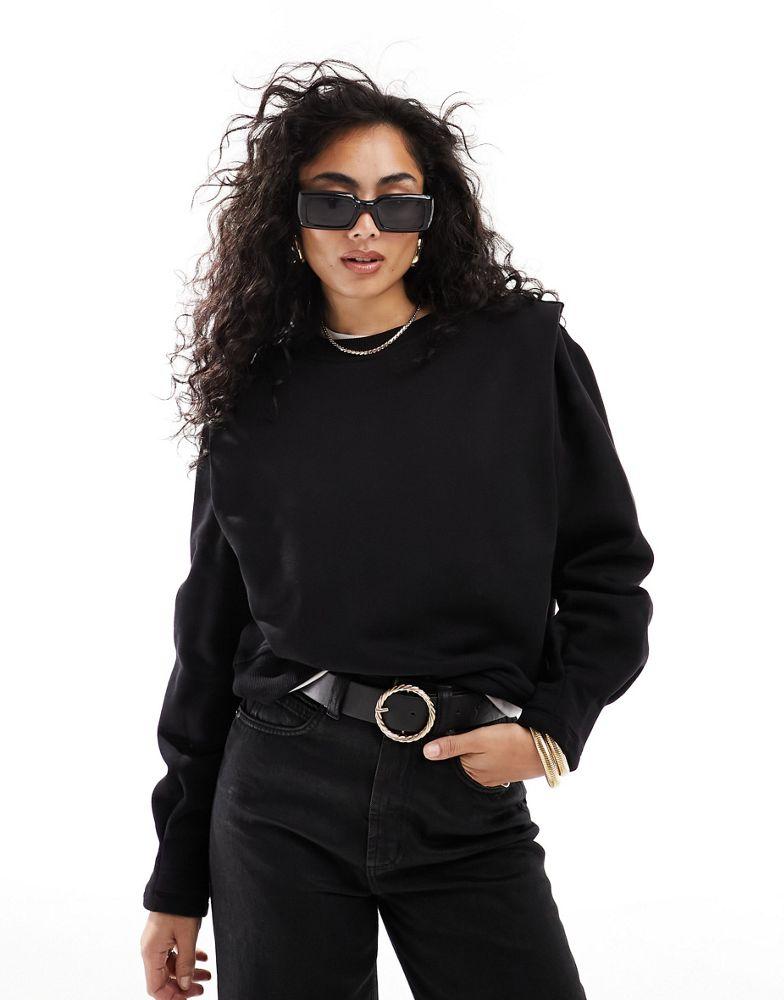 & Other Stories & Other Stories sweatshirt with bold shoulder and pleated cuffs  in black
