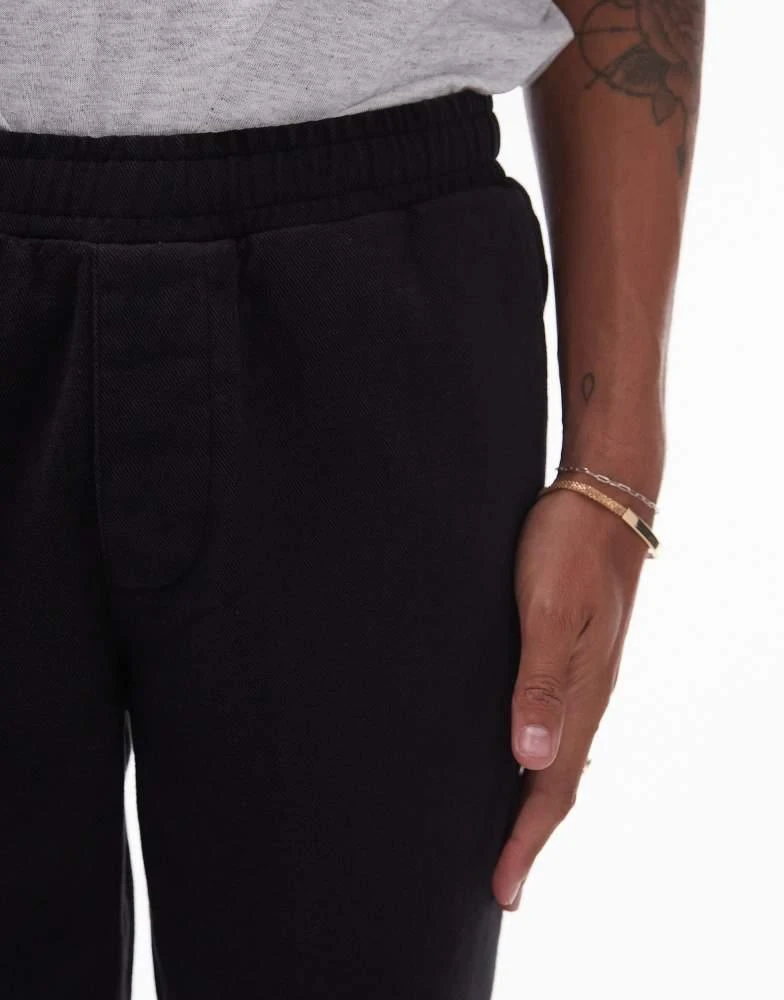 Topman Topman tapered trousers with elasticated waistband in black 5