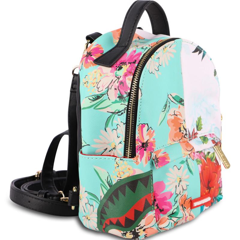 Sprayground The sanctuary quattro backpack in white and turquoise