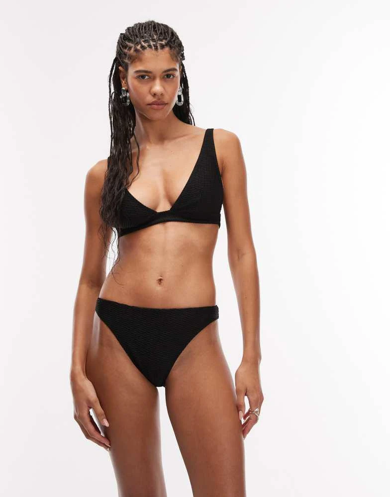 
Other Stories 
Other Stories mix and match textured bikini bottoms in black