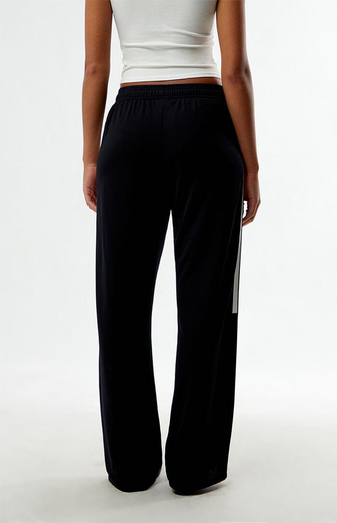 Shop Black Tiro Q2 Wide Leg Track Pants on Sale at
