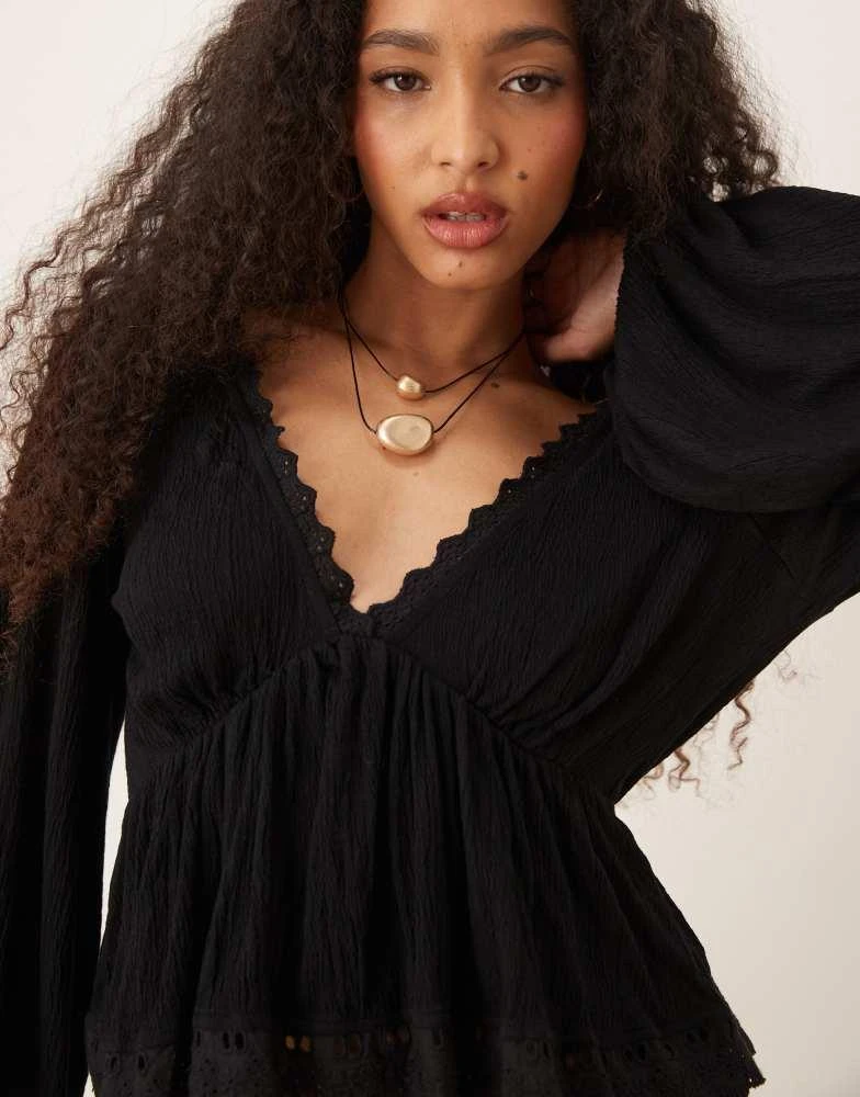 ASOS ASOS DESIGN crinkle tie back balloon sleeve top with lace trim in black - BLACK 4