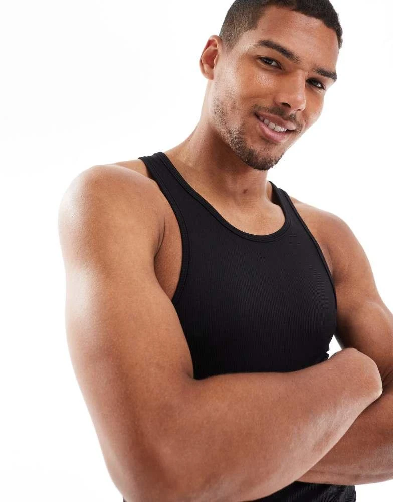 ASOS ASOS 4505 slim fit seamless rib racer front vest in black 2
