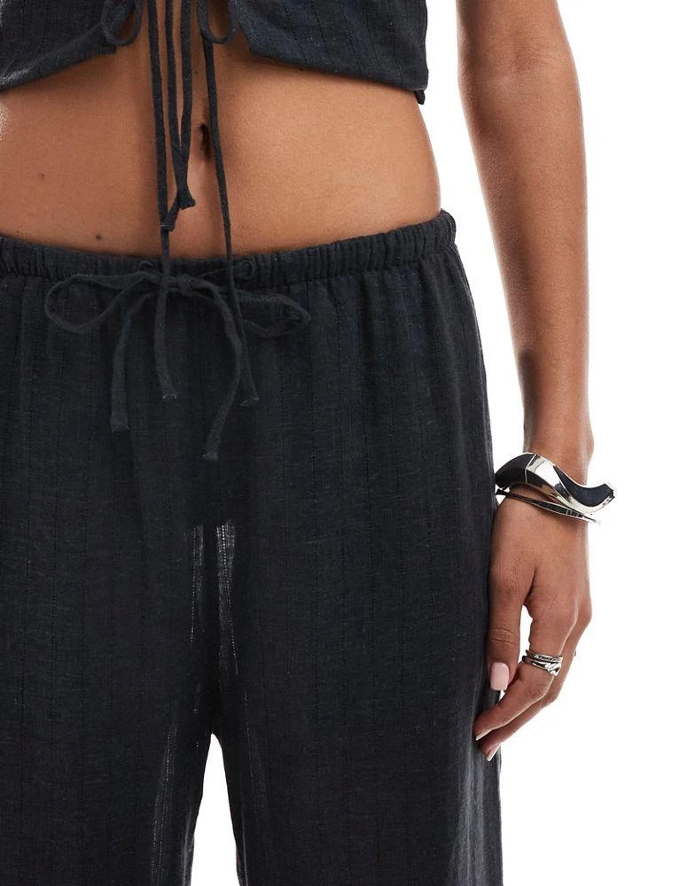 Weekday Weekday Mia co-ord pointelle trousers in off-black 4