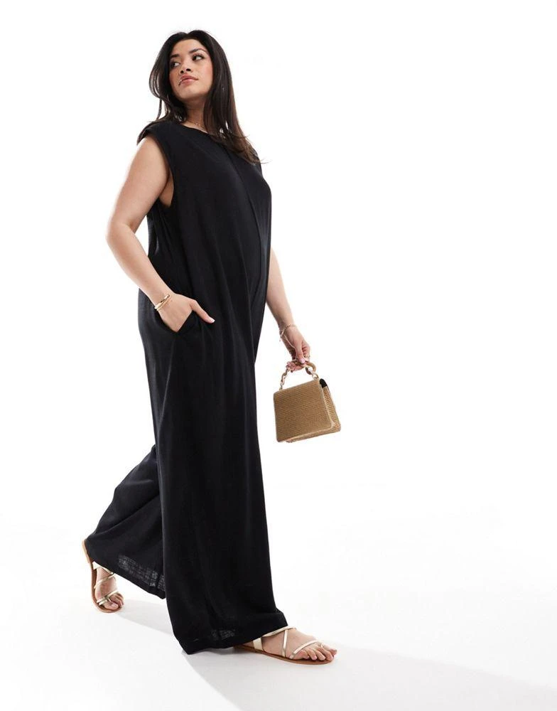 ASOS ASOS DESIGN Curve shoulder pad column wide leg jumpsuit in black 1