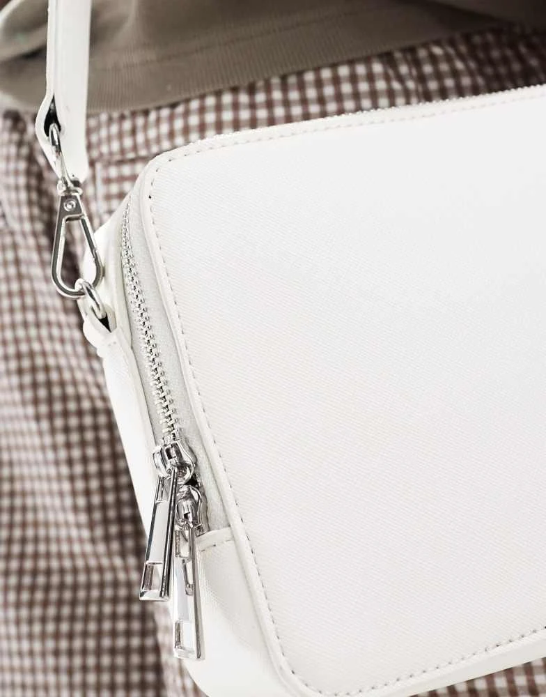 ASOS ASOS DESIGN large faux leather cross body camera bag in white 2