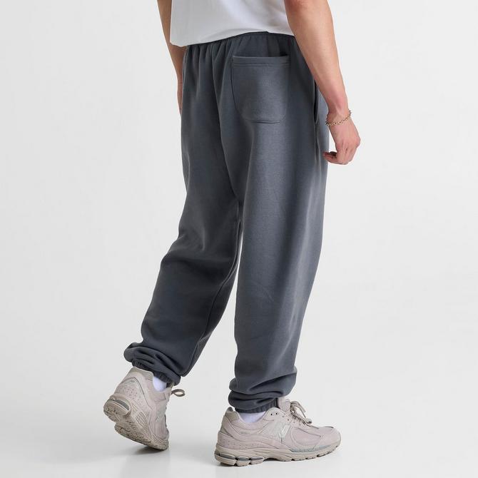Shop Men's New Balance Logo Graphic Fleece Jogger Sweatpants