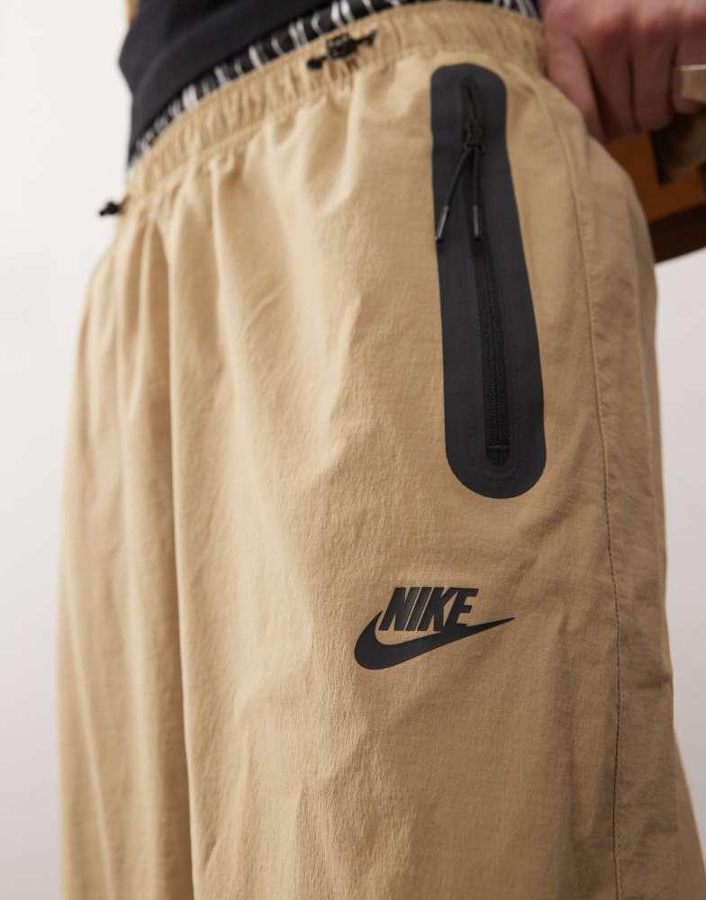 NIKE Nike Tech woven trouser in beige