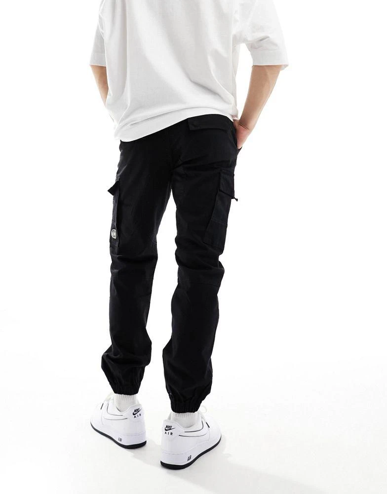 Criminal Damage Criminal Damage cuffed leg cargo pants with side leg army pockets in black 2