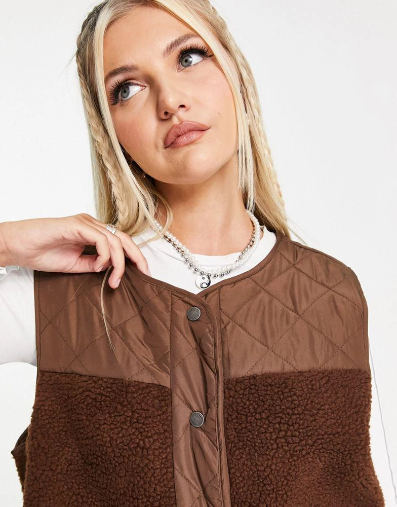 Noisy May Noisy May longline mixed quilted and teddy gilet in brown 3