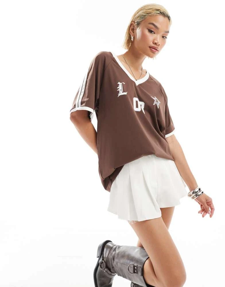 Lioness Lioness v neck sports jersey top in brown with white contrast trims 1