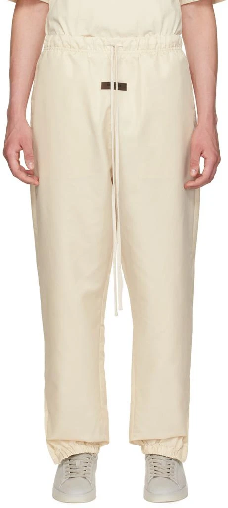 Fear of God ESSENTIALS Off-White Drawstring Track Pants 1