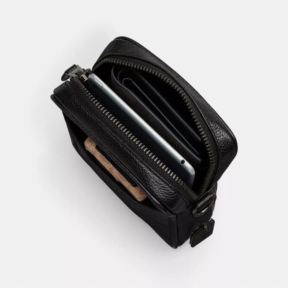 Shop Coach X Peanuts Sullivan Crossbody Bag In Signature