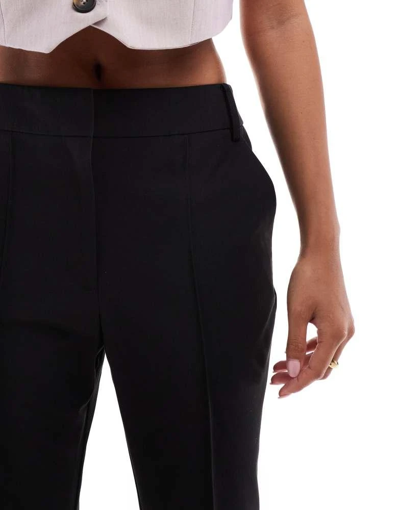 ASOS ASOS DESIGN Petite tailored seam detail slim straight ankle grazer trousers in black 4