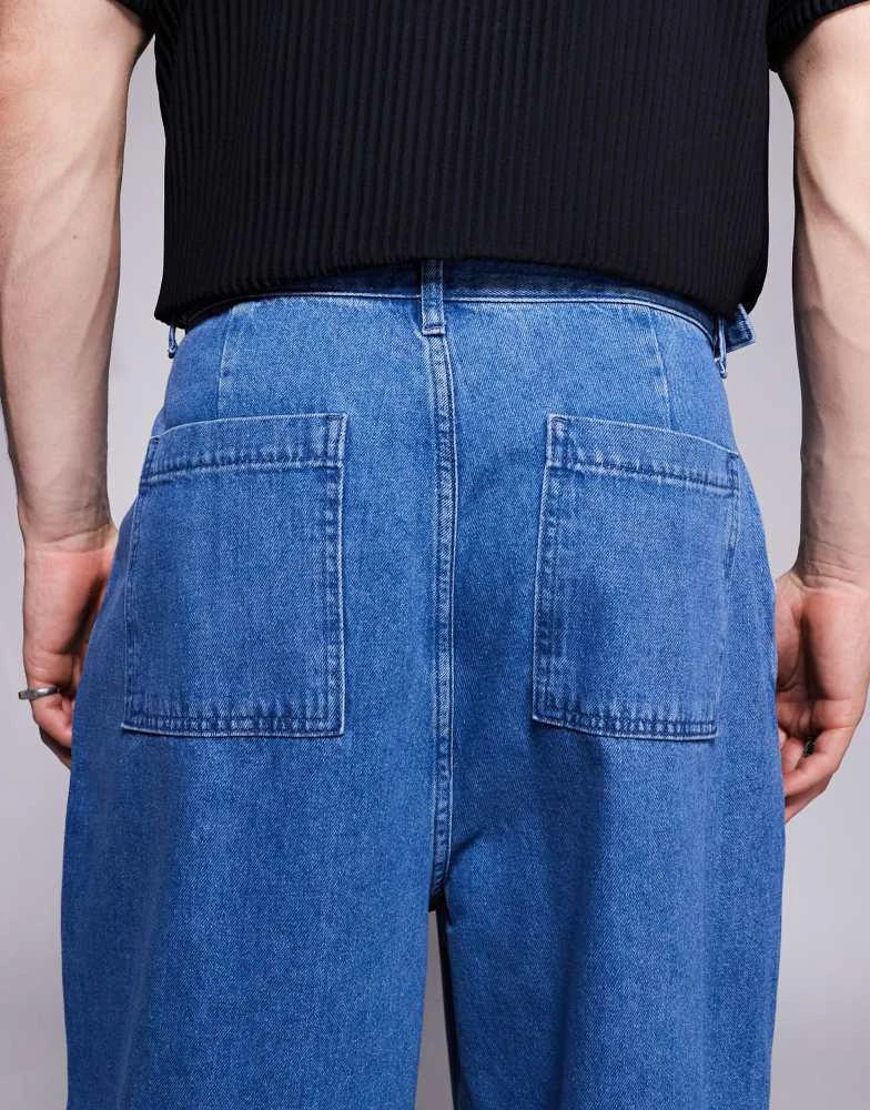 ASOS ASOS DESIGN oversized baggy jeans with side belts in mid wash blue 4