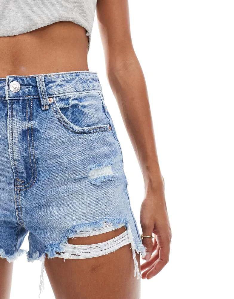 Stradivarius Stradivarius D75 ripped denim shorts in medium blue 4