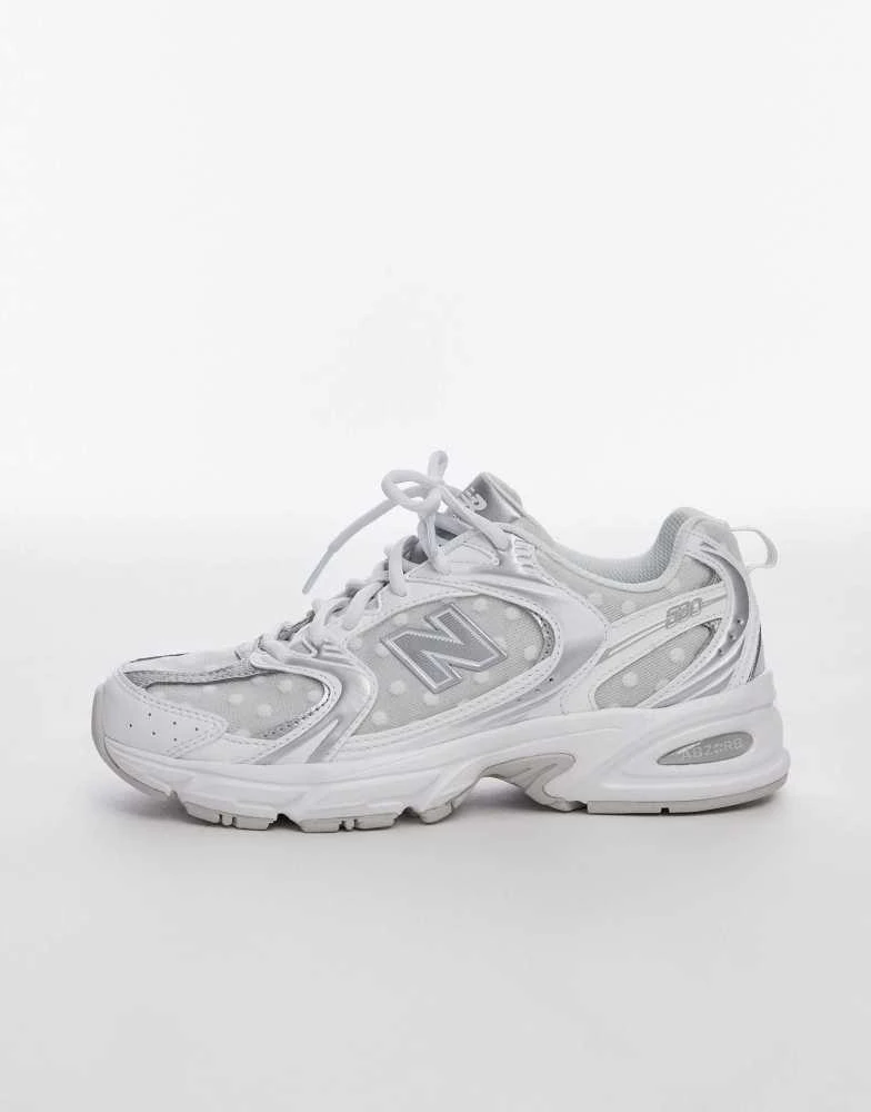 New Balance New Balance 530 trainers in white and silver polka dot 2