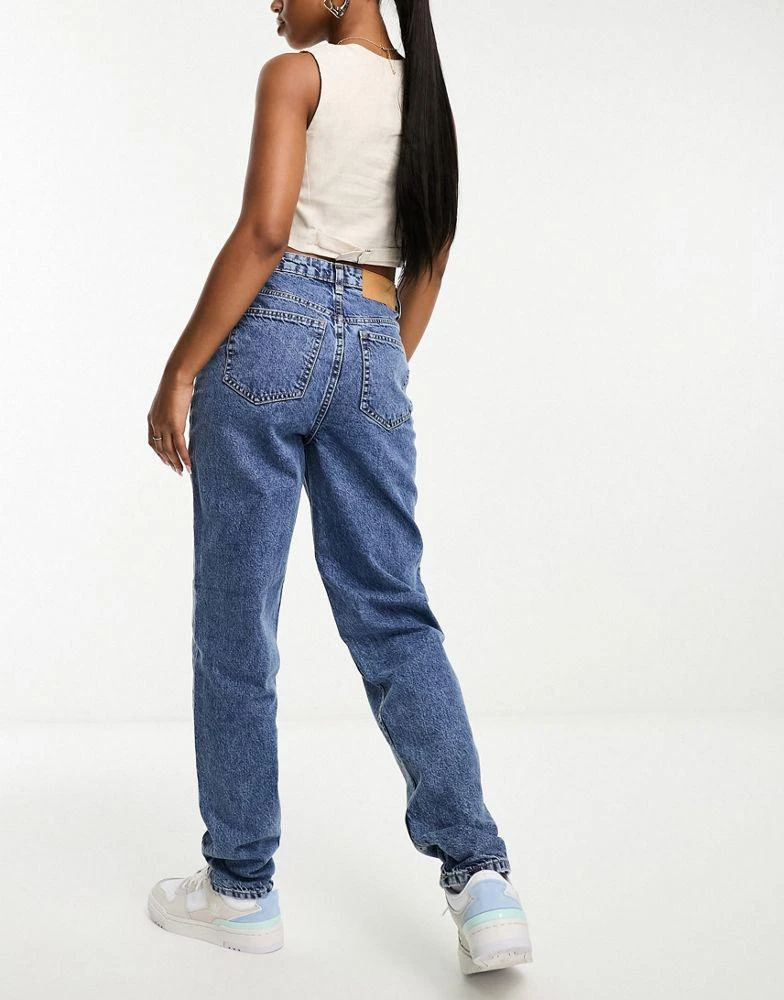 ASOS ASOS DESIGN high rise relaxed mom jeans in mid blue 2