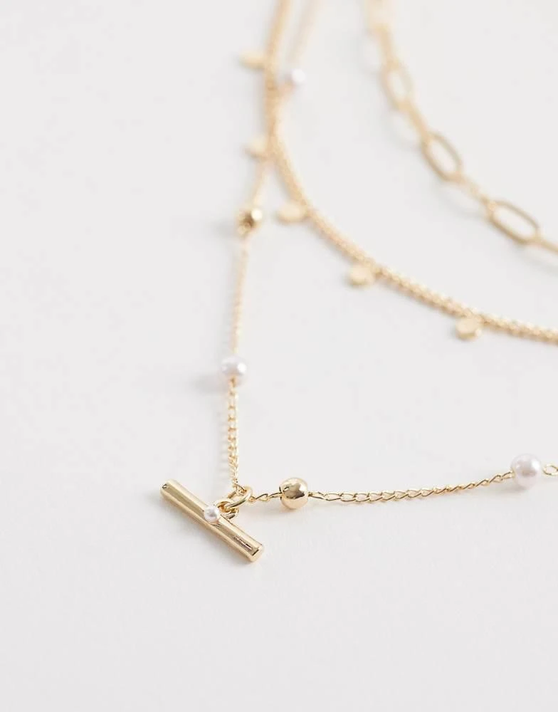 ASOS ASOS DESIGN multi-row necklace with faux pearls and t-bar detail in gold tone 2