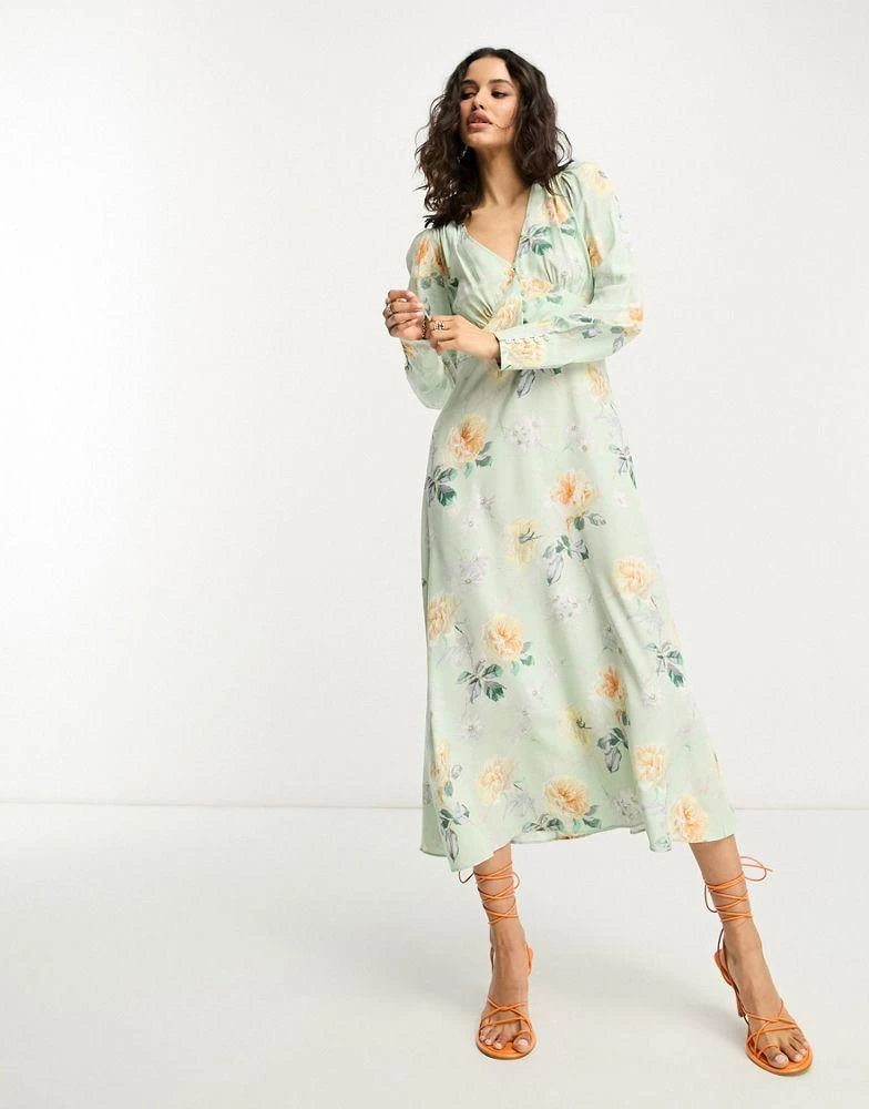 & Other Stories & Other Stories button detail midi dress in green floral 1