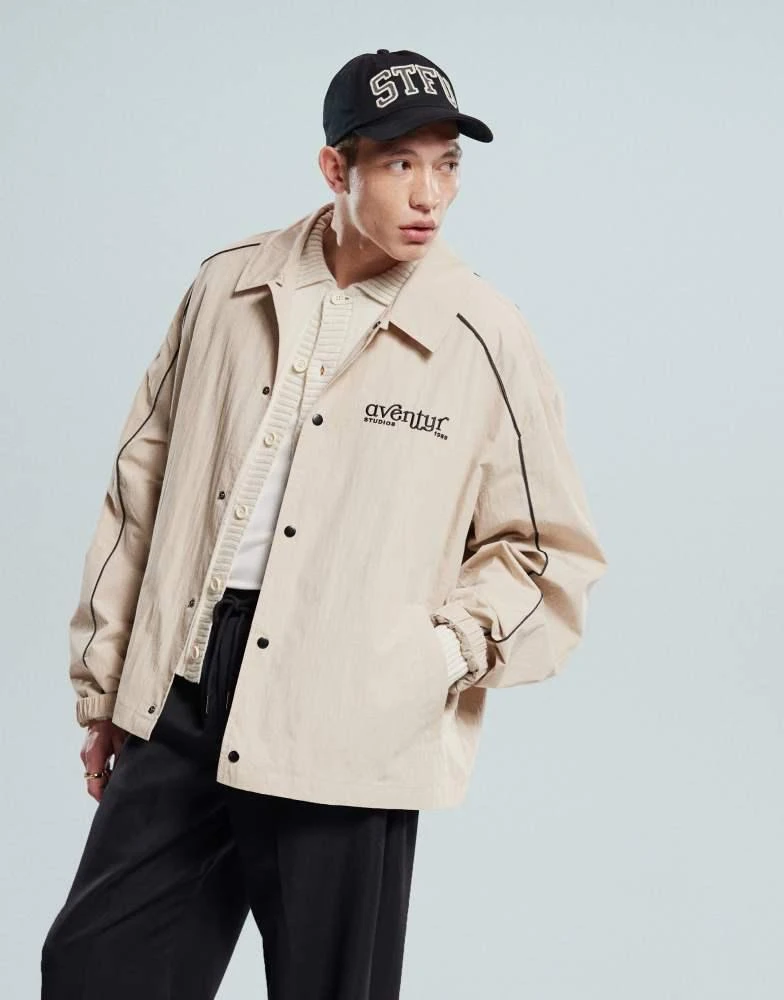 ASOS ASOS DESIGN oversized coach jacket with embroidery in stone 1