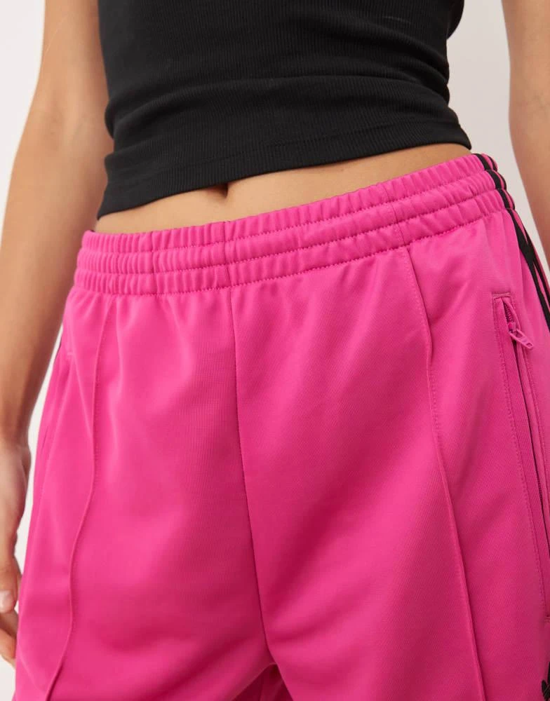 Adidas adidas Originals Adicolor classic firebird loose track pants in fuchsia and black 5