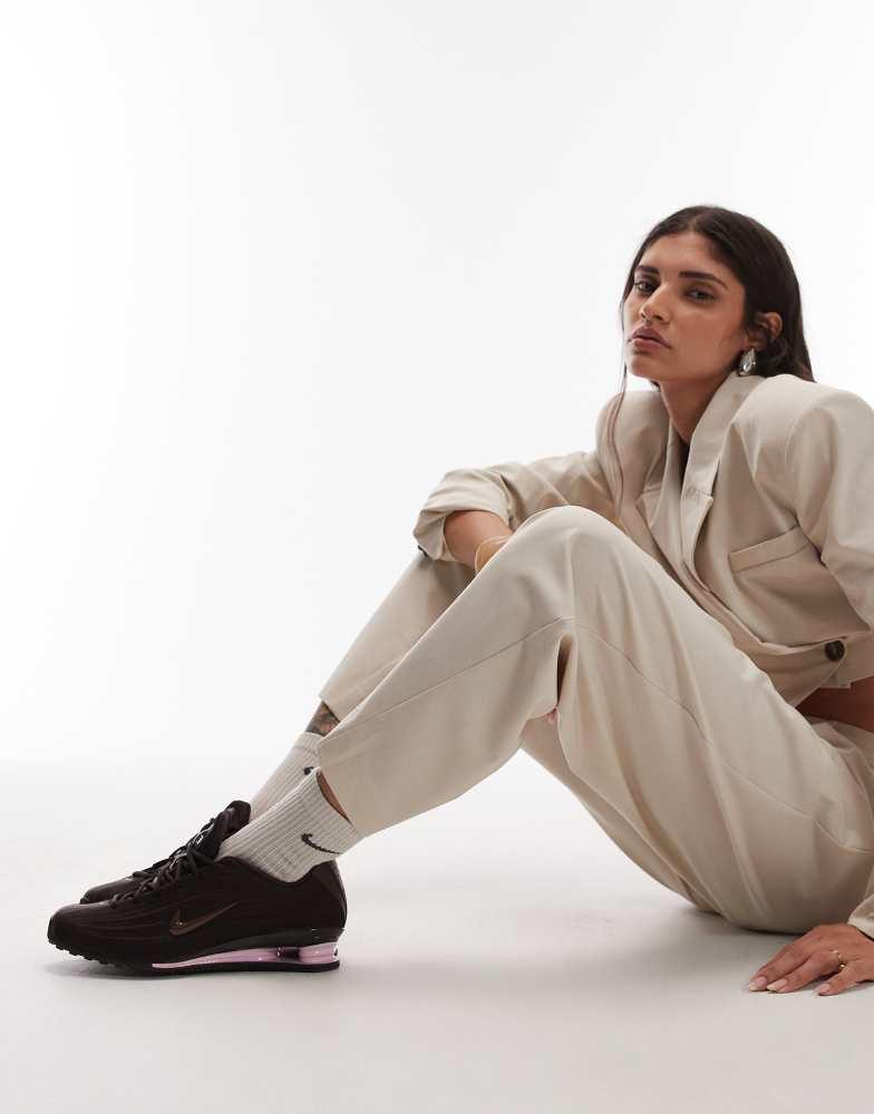 Shop Nike Shox Z trainers in brown and pink on Sale at BeyondStyle